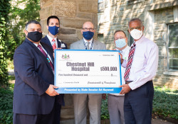 September 15, 2021: Sen. Haywood visited Chestnut Hill Hospital to deliver a check for $500,000 to purchase a new air conditioning unit for the facility.