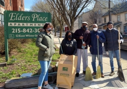 April 2, 2022: Senator Haywood and Legislative Assistant Emily Pugliese clean sidewalk with neighbors in Germantown.